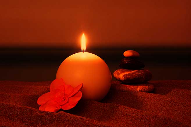 candle-beach-cairn-meditation-dreamstime_l_138181692-opt